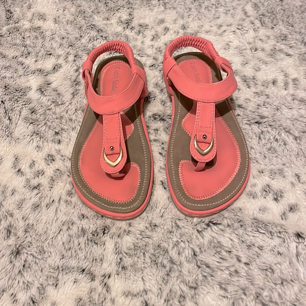 Casual Comfort Sandal, size 6, corral pink in color, buttery smooth to the feel.